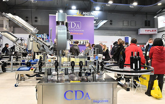 Visitors around a bottling stand